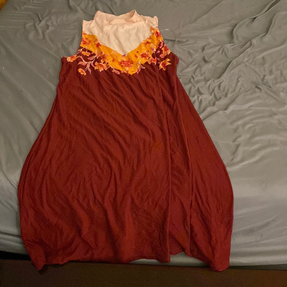 This dress is a maxi and the size is a Large in Women.